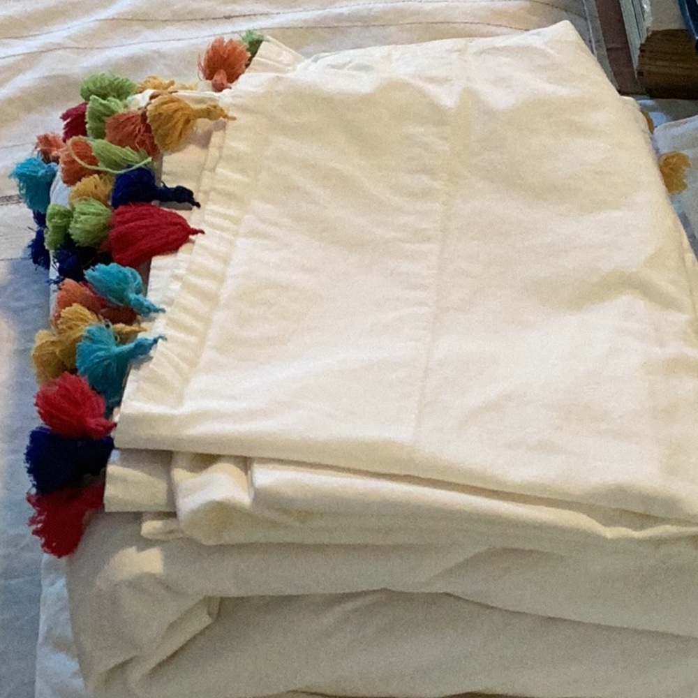 Set of white queen size sheets with tassels from Pottery Barn